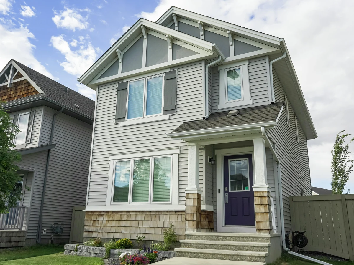 exterior-painting-suburban-house-exterior-exeter-decorators Exterior of a suburban house — garage door painting in Exeter by Exeter Decorators