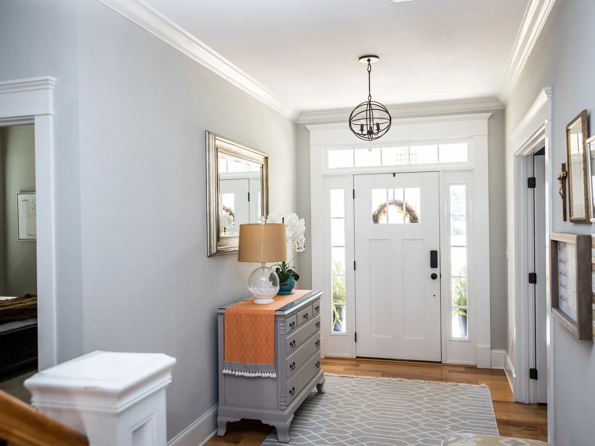 Grey hallway with white trim painting in Woodbury by Exeter Decorators
