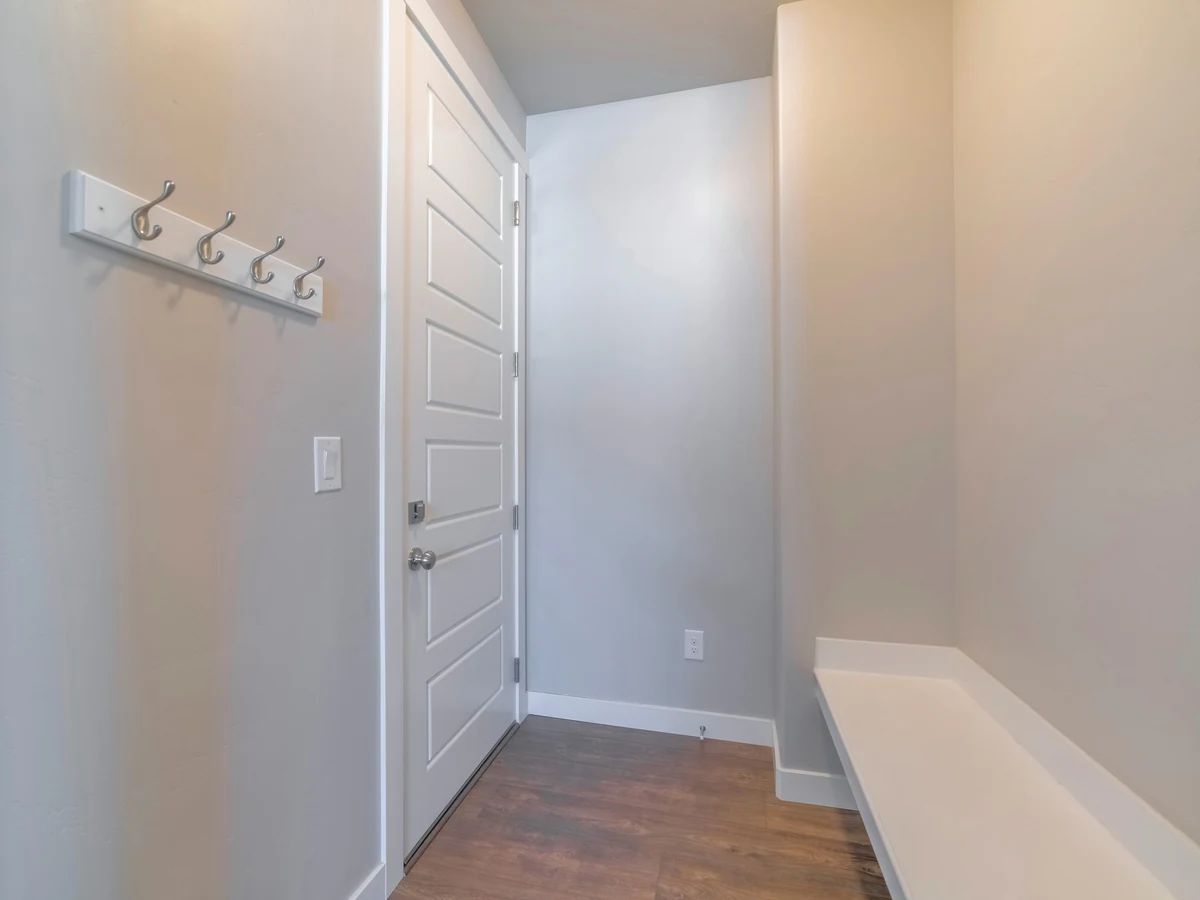 Hallway painting in Newton Poppleford, simple grey hallway with clean painted finish