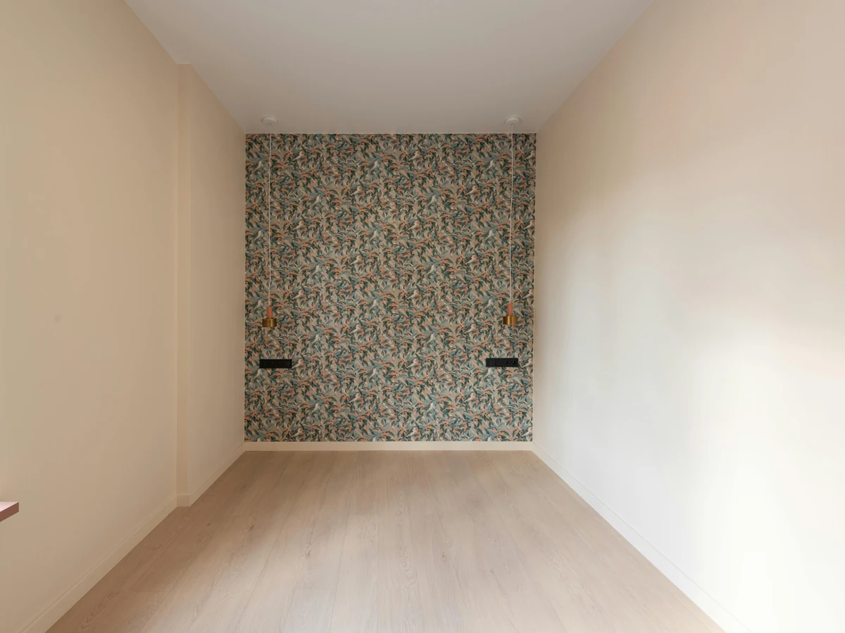 Freshly painted empty room ready for finishing in Seaton property by Exeter Decorators